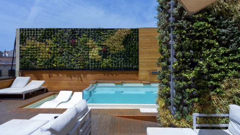 Hotel Well & Come rooftop pool and chairs of one of the best design. hotels in Barcelona