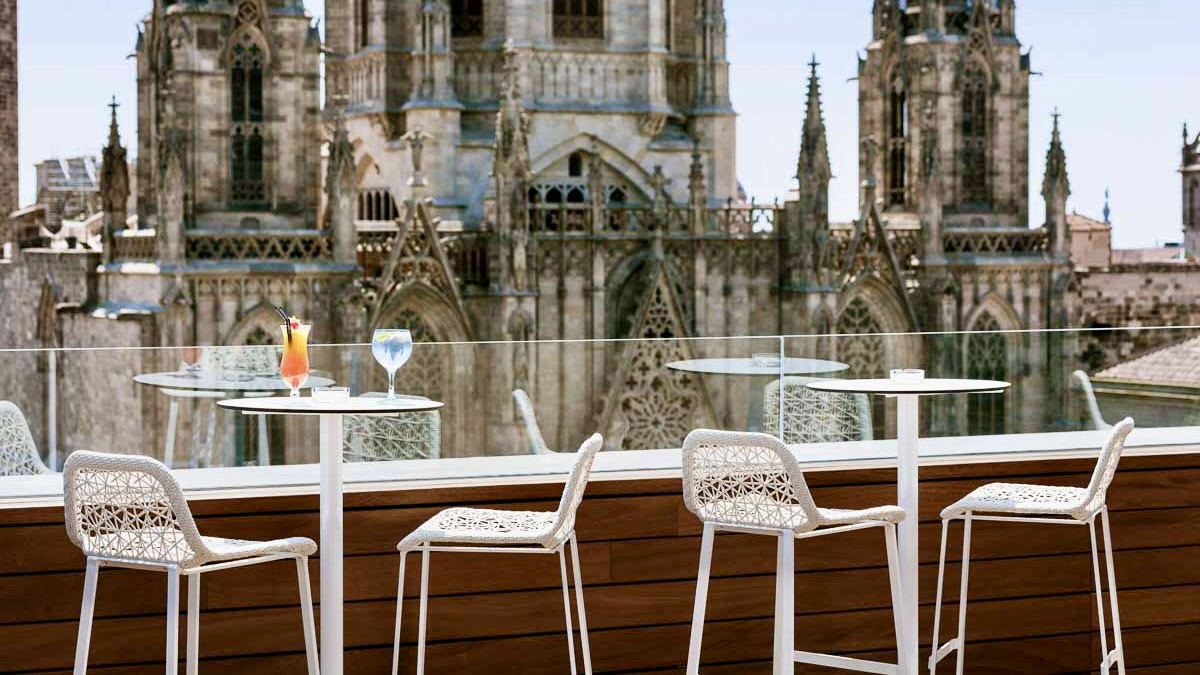 Hotel Colon Barcelona one of the best barcelona hhotels with rooftop bars view over church